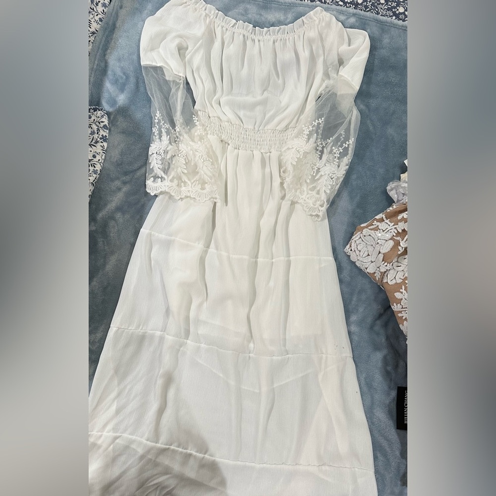 White maxi dress with lace details. Medium. No tags new.